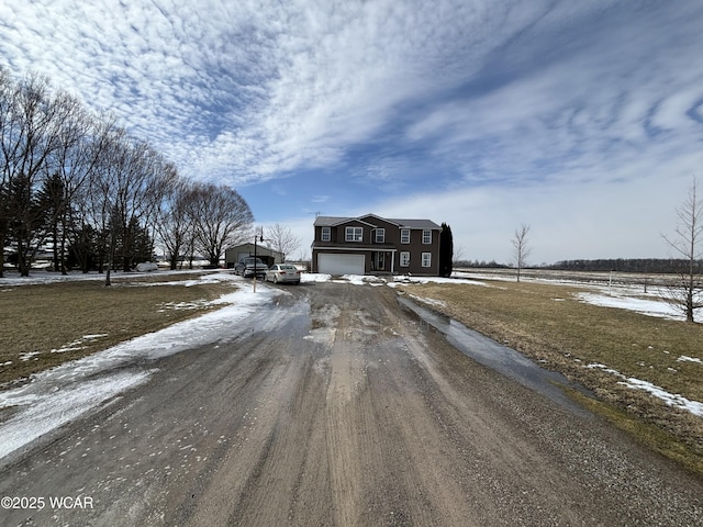 view of street with driveway