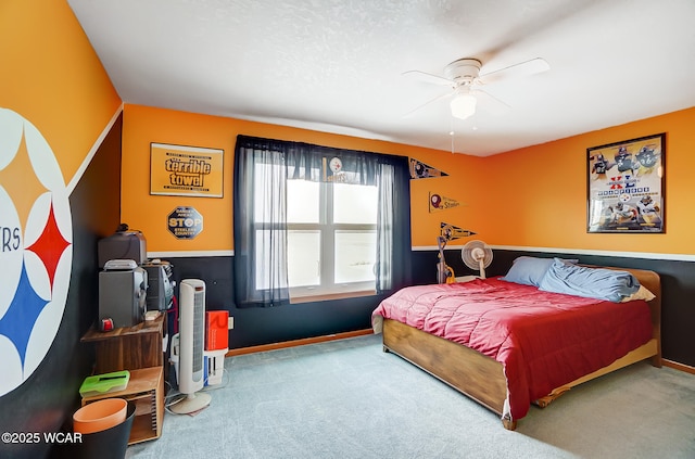 bedroom featuring baseboards, carpet floors, and ceiling fan