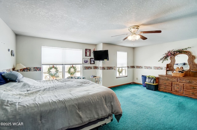 bedroom featuring carpet floors, a textured ceiling, baseboards, and ceiling fan