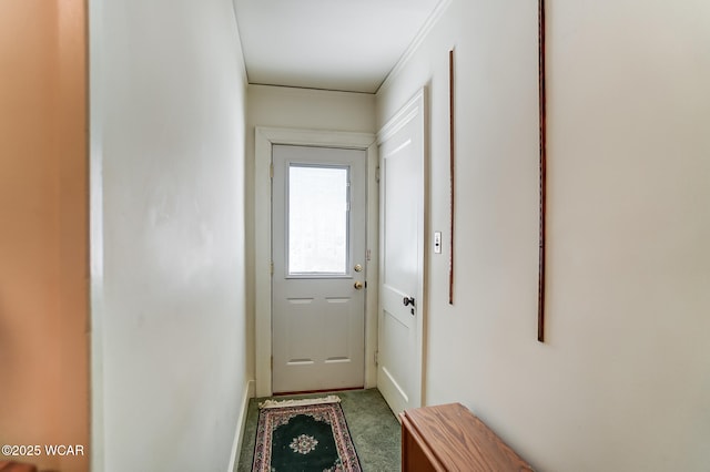 118 Boyd Ave, Van Wert, OH 45891 - doorway with baseboards and carpet flooring