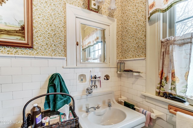 118 Boyd Ave, Van Wert, OH 45891 - bathroom with wallpapered walls, tile walls, and wainscoting