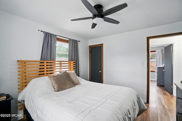 2412 W Spring St, Lima, OH 45805 - bedroom with light wood-style floors and a ceiling fan