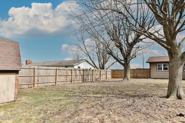 view of yard featuring a fenced backyard