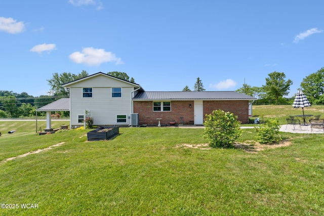 2855 State Route 67, Belle Center, OH 43310 - rear view of house featuring a lawn