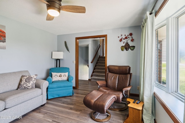 2855 State Route 67, Belle Center, OH 43310 - living room with wood finished floors, ceiling fan, and stairs