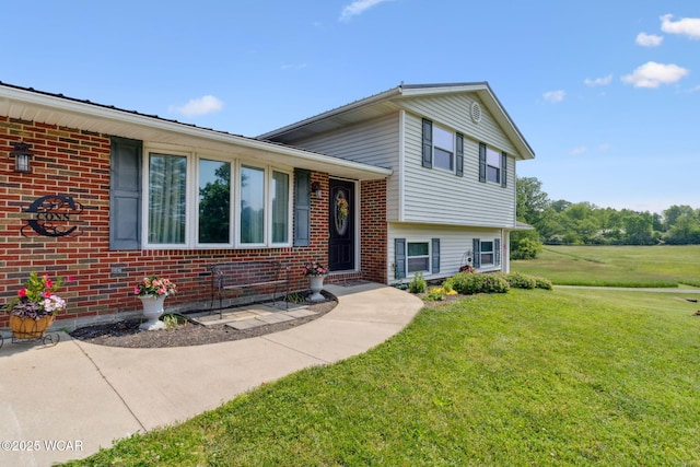 2855 State Route 67, Belle Center, OH 43310 - tri-level home featuring a front yard and brick siding
