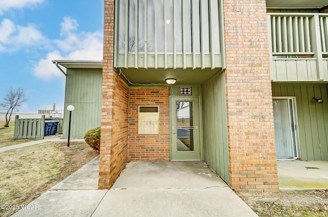 doorway to property featuring a balcony