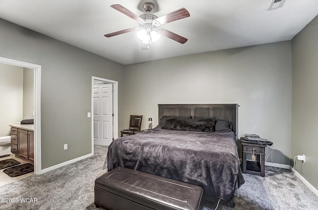 bedroom featuring connected bathroom, ceiling fan, and carpet