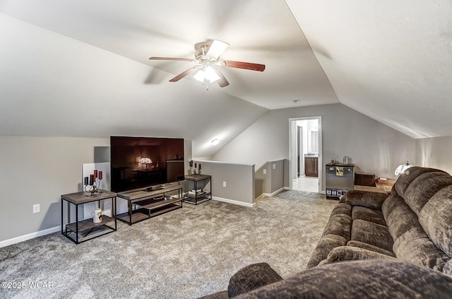 carpeted living room featuring ceiling fan and lofted ceiling