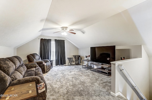 living room with ceiling fan, lofted ceiling, and carpet flooring