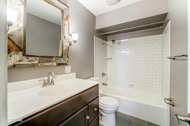 bathroom with tile patterned floors, vanity, toilet, and shower / bath combination