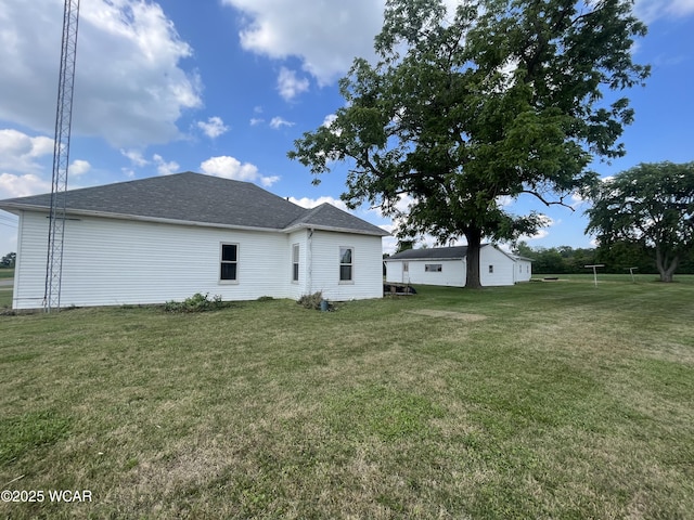 2845 Greely Chapel Rd, Lima, OH 45806 - rear view of house with a yard