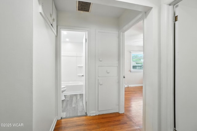 806 Tremont Ave, Lima, OH 45801 - hallway featuring wood finished floors and baseboards