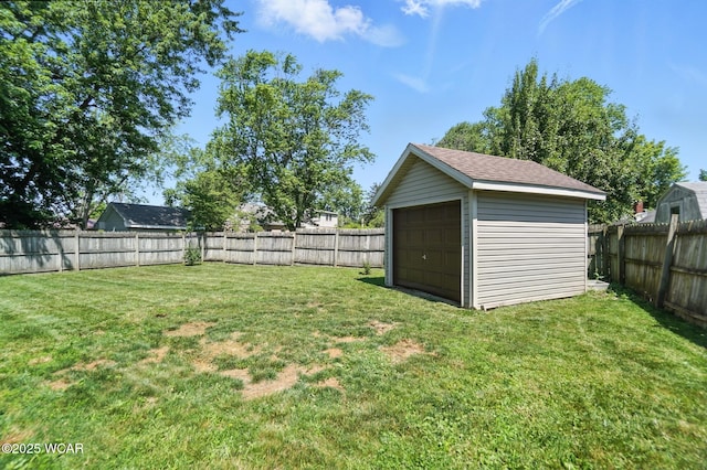 806 Tremont Ave, Lima, OH 45801 - fenced backyard featuring a garage and a storage unit