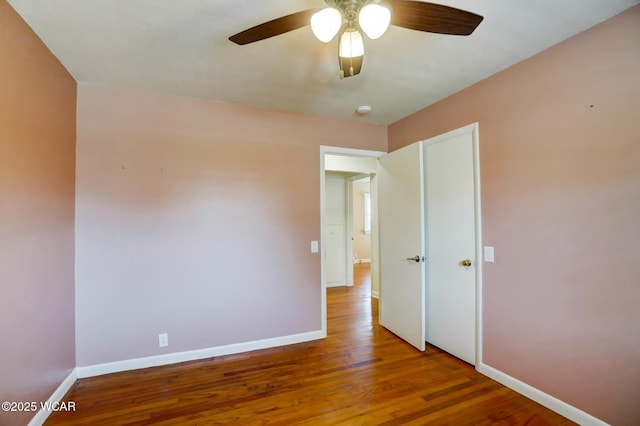 806 Tremont Ave, Lima, OH 45801 - empty room featuring wood finished floors, a ceiling fan, and a smoke detector