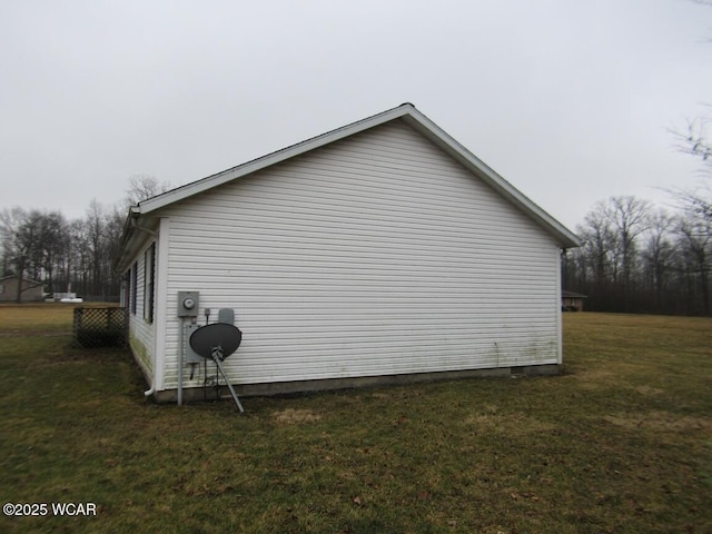 view of property exterior featuring a yard