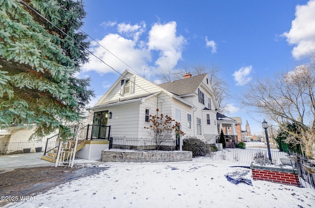 view of snow covered property