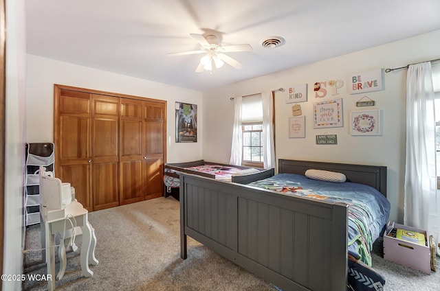 bedroom featuring carpet floors and ceiling fan