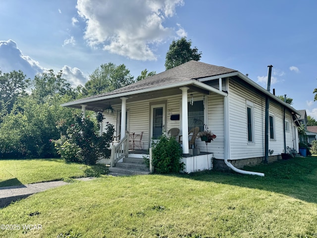 702 W Vine St, Lima, OH 45804 - view of front of house featuring a front lawn and covered porch