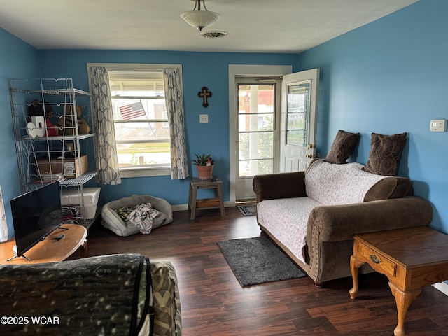 702 W Vine St, Lima, OH 45804 - living area featuring healthy amount of natural light and wood finished floors