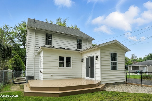 418 S Judkins Ave, Lima, OH 45805 - back of property with a fenced backyard, a deck, and crawl space