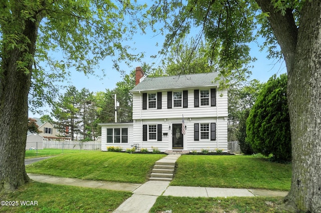418 S Judkins Ave, Lima, OH 45805 - colonial house featuring a chimney