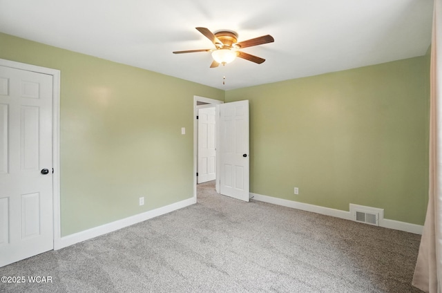 418 S Judkins Ave, Lima, OH 45805 - unfurnished room featuring a ceiling fan and carpet flooring