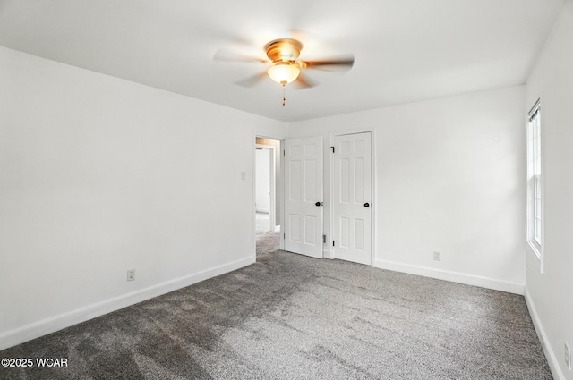 418 S Judkins Ave, Lima, OH 45805 - unfurnished bedroom featuring carpet flooring and a ceiling fan