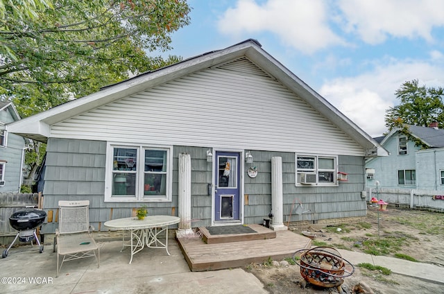 back of property with a patio area