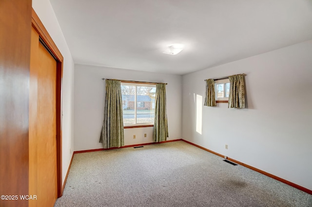 view of carpeted spare room