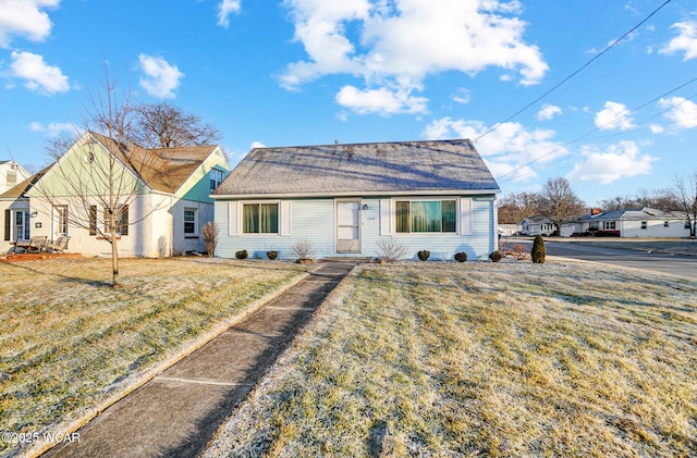 bungalow with a front lawn