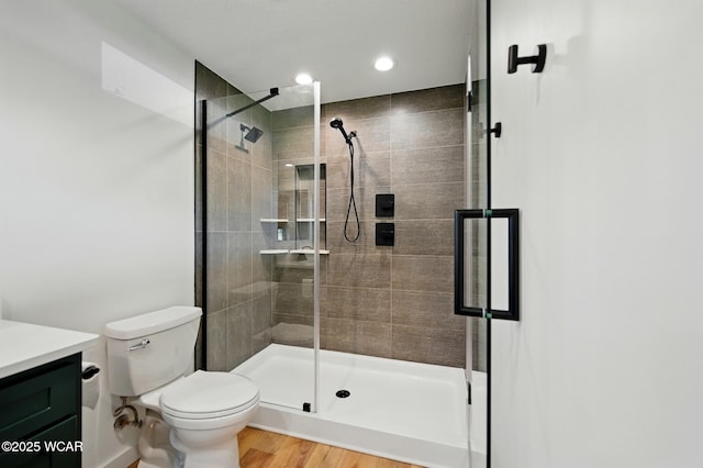 3485 Sugar Creek Rd, Lima, OH 45807 - bathroom featuring vanity, a shower stall, wood finished floors, and recessed lighting