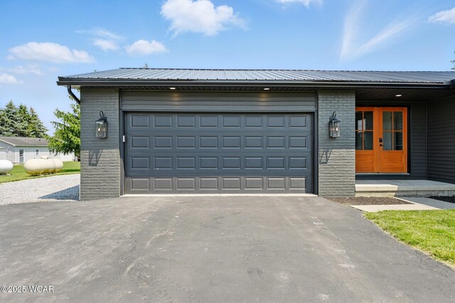 3485 Sugar Creek Rd, Lima, OH 45807 - garage with asphalt driveway