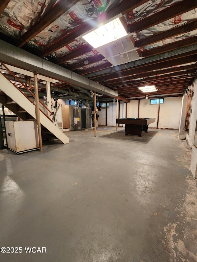 below grade area featuring billiards and stairs
