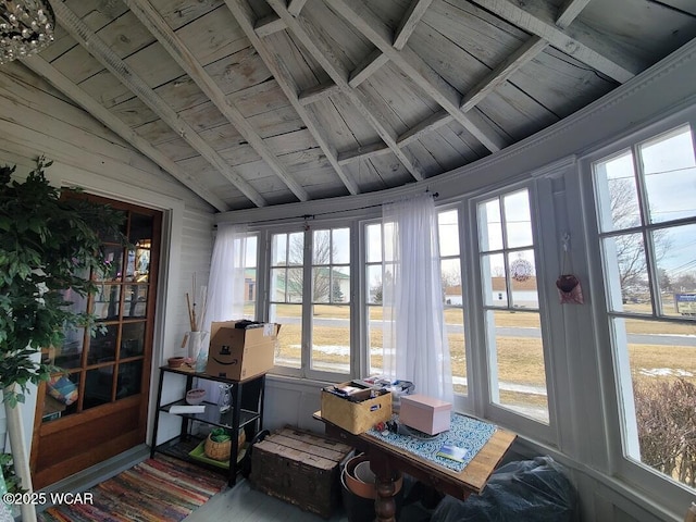 sunroom / solarium with wood ceiling and vaulted ceiling with beams