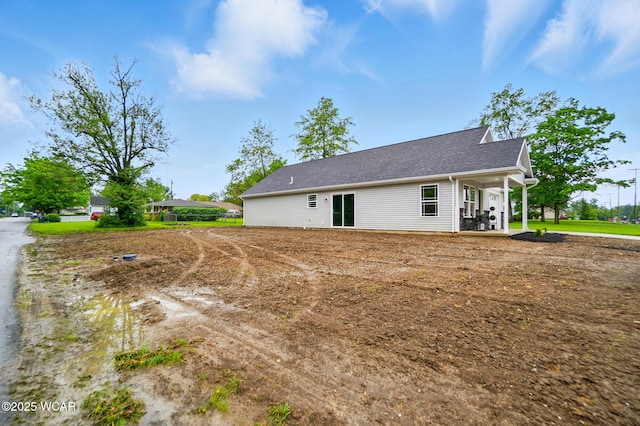 1501 W Spring St, Lima, OH 45805 - rear view of property with a shingled roof