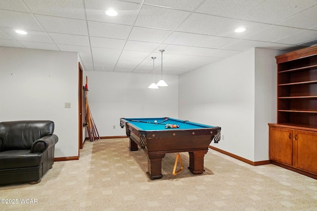 game room featuring a paneled ceiling, light carpet, baseboards, and pool table