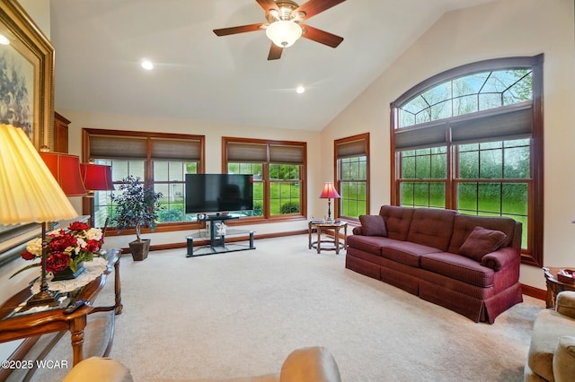 living room featuring baseboards, plenty of natural light, recessed lighting, and carpet