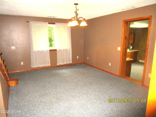 16255 Elevator Rd, Street, Forest, OH 45843 - empty room featuring carpet, a chandelier, a baseboard heating unit, and stairs