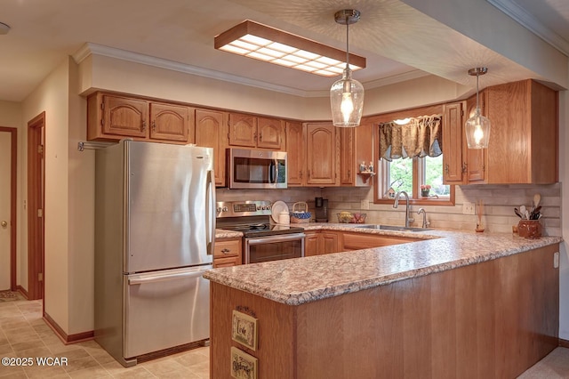 kitchen featuring hanging light fixtures, a sink, a peninsula, decorative backsplash, and stainless steel appliances