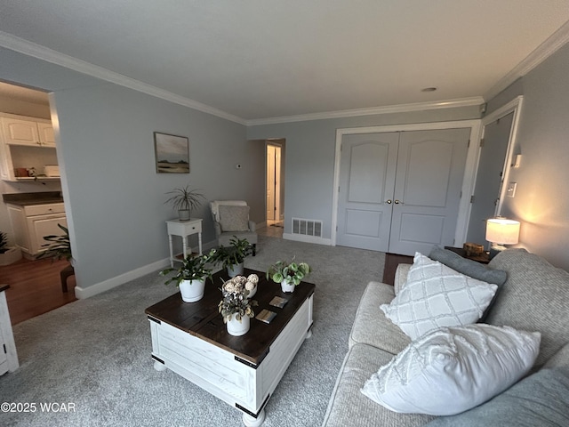 2275 N Cable Rd Unit 60, Lima, OH 45807 - carpeted living area featuring baseboards, visible vents, and crown molding