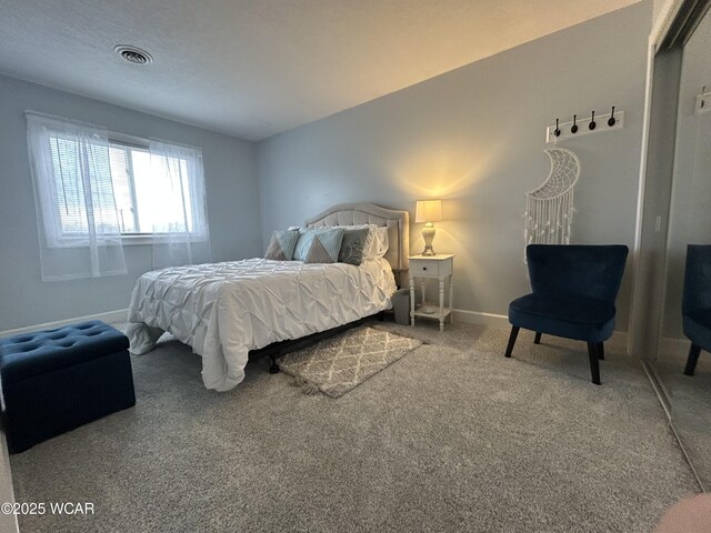 2275 N Cable Rd Unit 60, Lima, OH 45807 - carpeted bedroom featuring baseboards and visible vents
