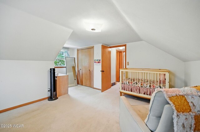 1317 Melrose St, Lima, OH 45801 - bedroom with lofted ceiling, light carpet, and a closet