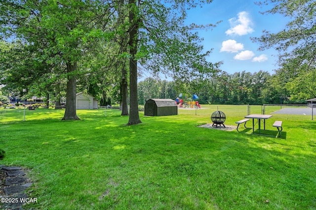 1317 Melrose St, Lima, OH 45801 - view of yard with a storage shed and a playground