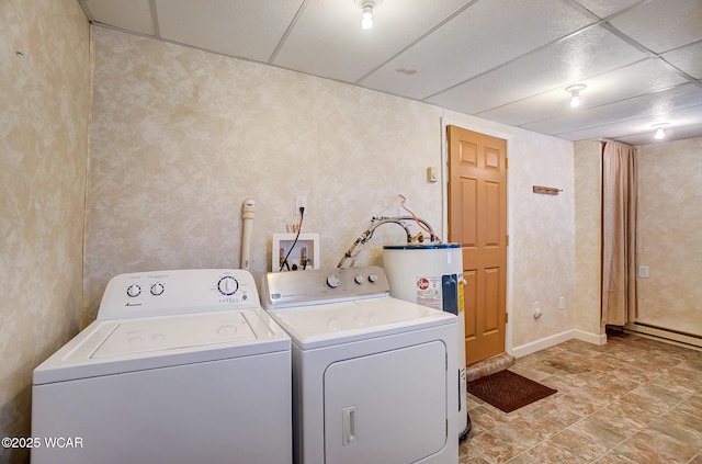 laundry room featuring washer and clothes dryer and laundry area