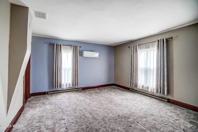 unfurnished room with baseboards, visible vents, an AC wall unit, and baseboard heating