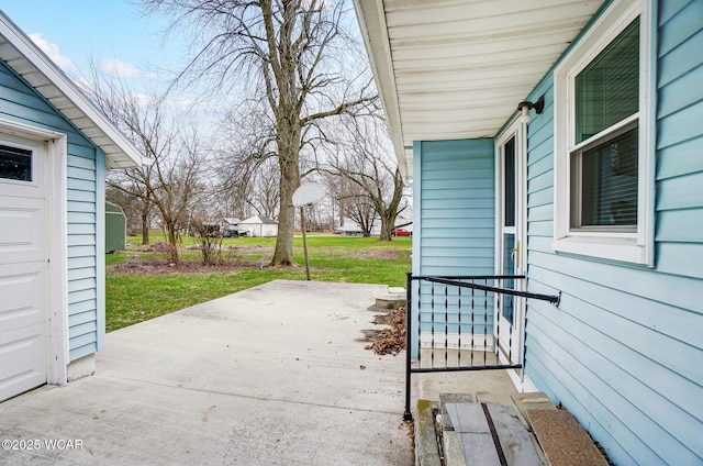 view of patio / terrace with a garage