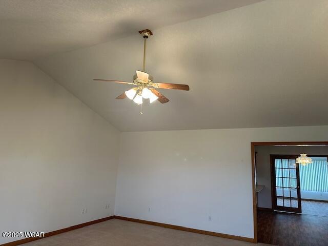 1461 Cessna Ave, Lima, OH 45807 - empty room featuring lofted ceiling, a chandelier, ceiling fan, and baseboards