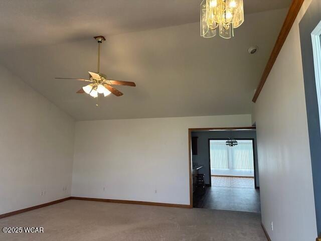 1461 Cessna Ave, Lima, OH 45807 - empty room with a chandelier, vaulted ceiling, carpet, baseboards, and ceiling fan