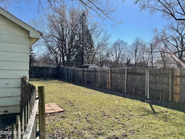 view of yard featuring a fenced backyard